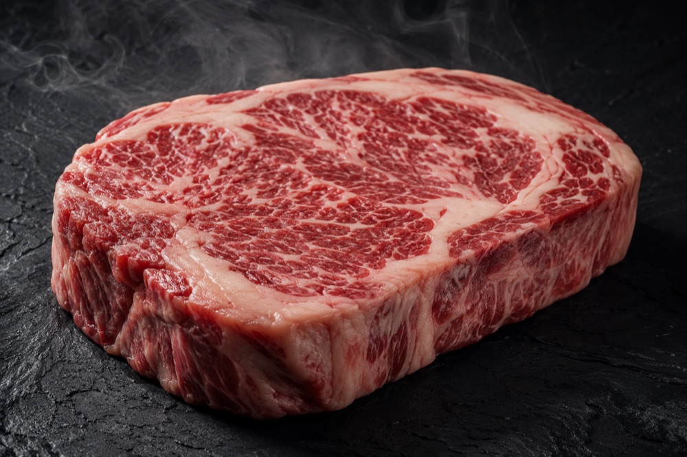 Premium beef cuts arranged on a butcher counter